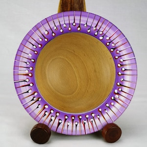 Handmade Decorated beech bowl with pyrographed bottom.