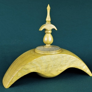 Winged box with matching finial