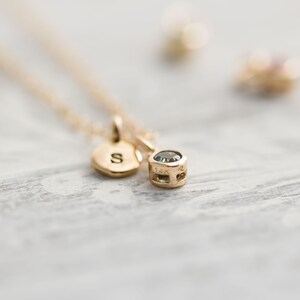 Solid yellow 14k gold birthstone charms on solid yellow gold chain.
