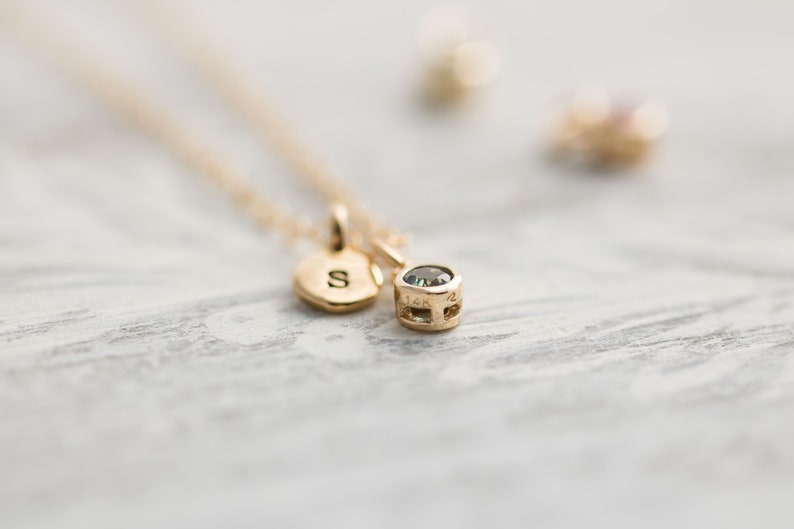 Solid yellow 14k gold birthstone charms on solid yellow gold chain.