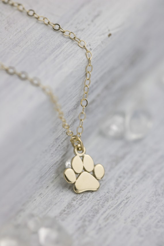 Tiny paw print on sale necklace