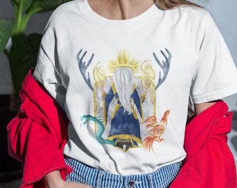 May include: White t-shirt with a colorful illustration of a figure with a crown, surrounded by a dragon, a phoenix, and antlers.