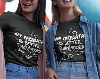 May include: Two friends wearing black t-shirts with the text "My Paradata is Better Than Yours" printed on them. They are holding pink and blue cotton candy and smiling at the camera.