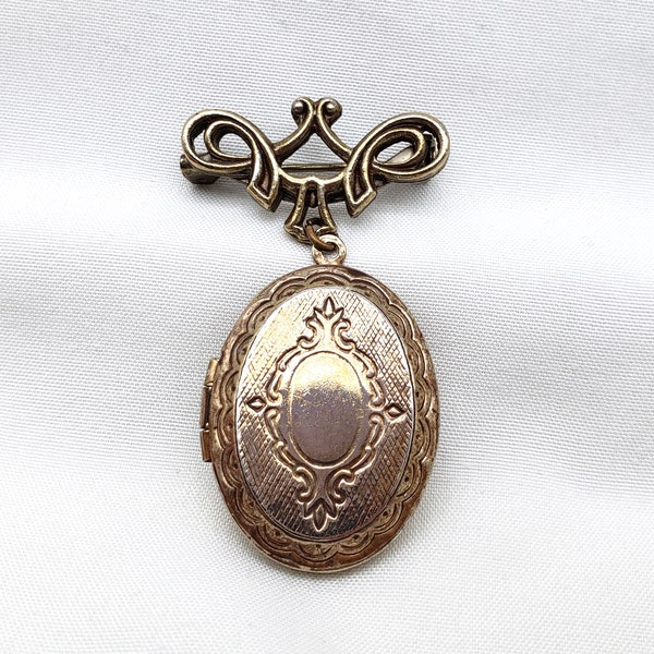 Vintage Locket Brooch Bow Pin Etched Gold Tone Metal Victorian Style Oval Photo Holder