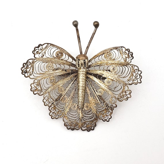 Silver filigree butterfly best sale brooch