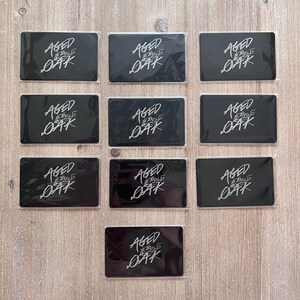 Matte black metal business card with engraved QR code and logo design.
Premium metal networking card for entrepreneurs and professionals.