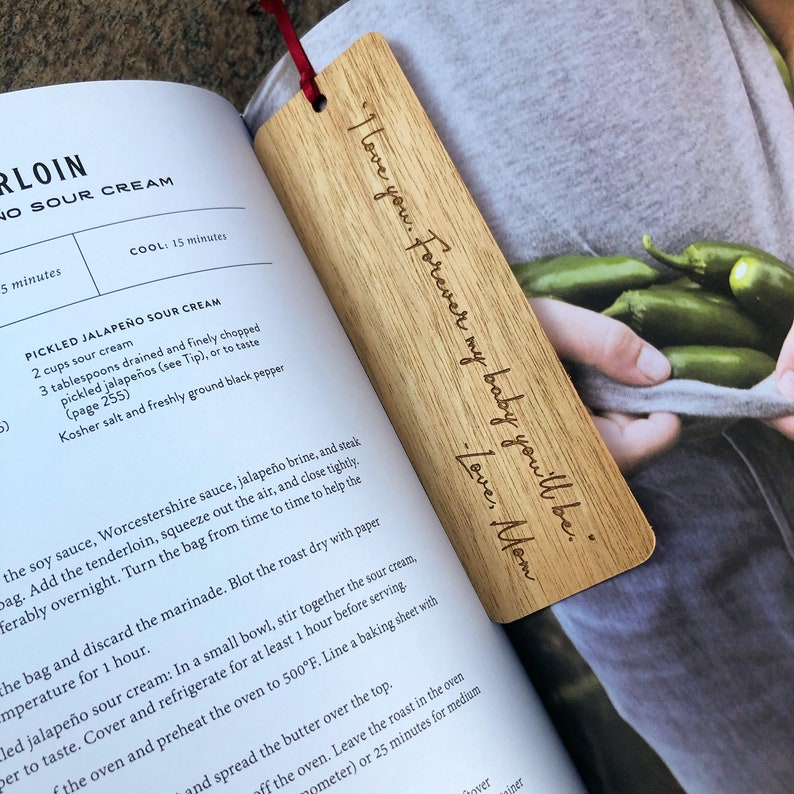 Handmade in the US. Engraved wooden bookmarks personalized with your handwriting or your favorite quote. Made from responsibly and sustainably sourced wood!