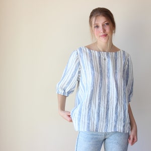 Softened linen blouse with short sleeves and round collar. image 7