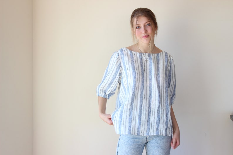 Softened linen blouse with short sleeves and round collar. image 7