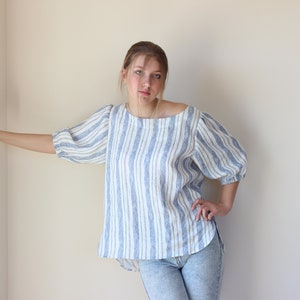 Softened linen blouse with short sleeves and round collar. image 5