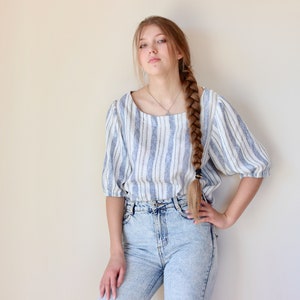 Softened linen blouse with short sleeves and round collar. image 6