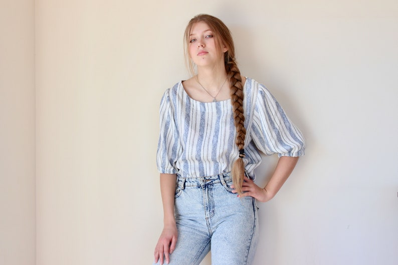 Softened linen blouse with short sleeves and round collar. image 6