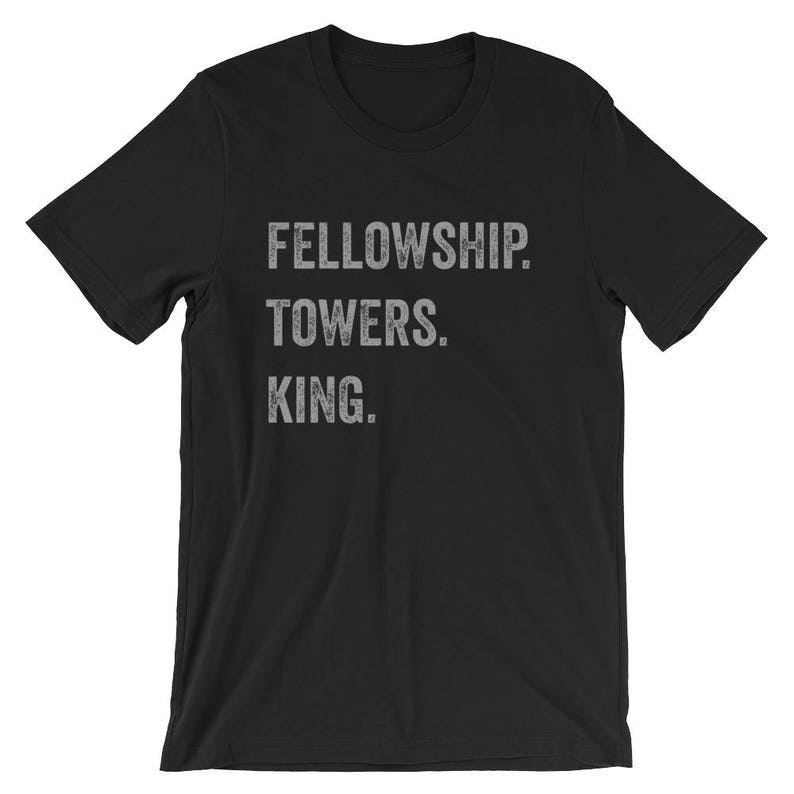 May include: Black t-shirt with the text "FELLOWSHIP. TOWERS. KING." printed in white.