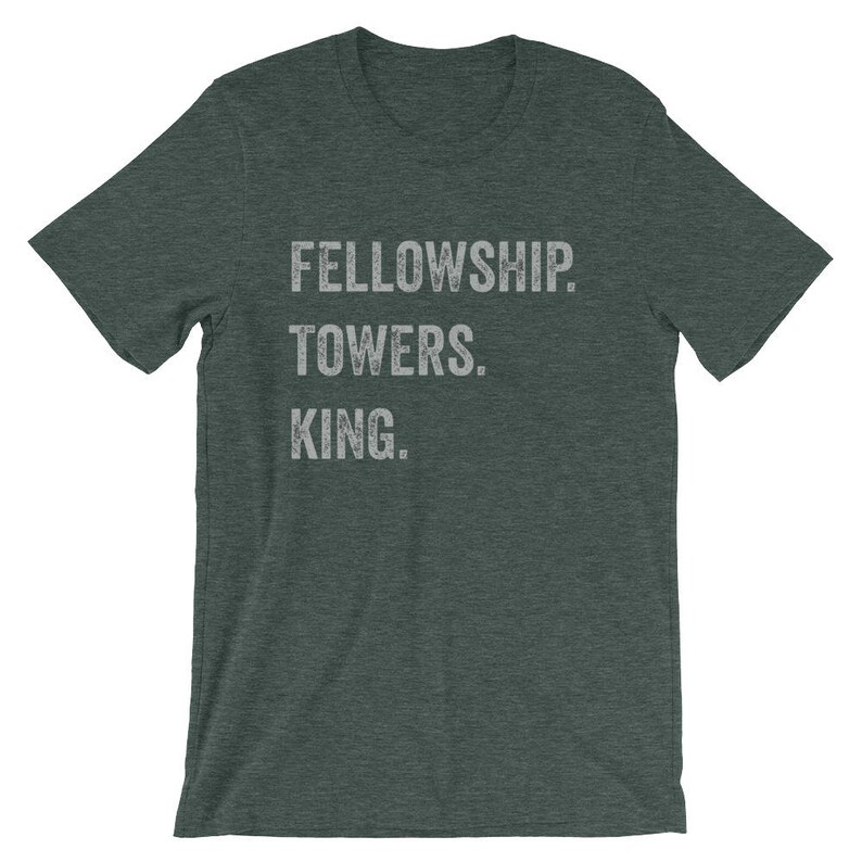 May include: A dark green t-shirt with the text "FELLOWSHIP. TOWERS. KING." printed in white.
