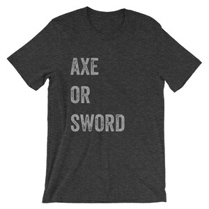 Puede incluir: Camiseta gris oscuro con el texto "AXE OR SWORD" impreso en blanco.