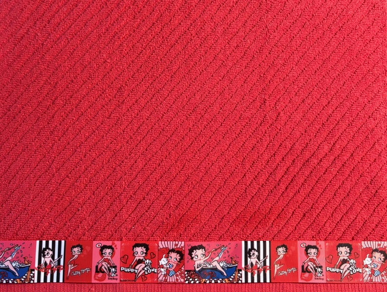 Betty Boop Red Kitchen Hand Towel. 16 x 26 inches long. 100% Cotton. Machine Washable. Bubblicious