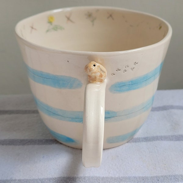 Bunny rabbit cup with blue stripes, dandilions, tiny beige rabbit & pawprints, ceramic mug, hand painted handmade gift for tea coffee lover