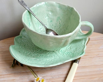 Green hand made cup with imprinted cabbage leaf, ceramic mug with translucent glaze, handmade pottery gift for tea coffee lover