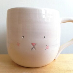 Fr/ühst/ückstasse aus feiner Keramik mit Hasen-Schwanz Durch das Aufstellen eines klassischen Teelichts im Inneren der Tasse wird der Kaninchen leuchten.