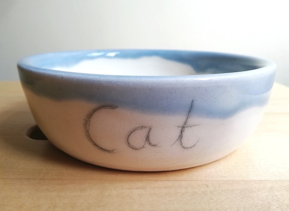 Ceramic cat bowl with grey blue glazed rim . Handmade pottery feeder with cat written on the side. Pottery gift for cat lover
