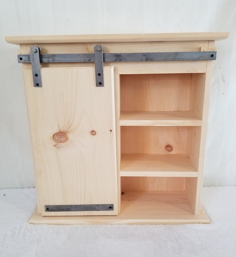 Sliding Barn Door Cabinet Measures 26 X 9 1 4 X 25 1 2 3 Cubbies On One Side And 2 On The Other Door Slides On Metal Rail