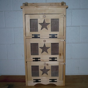 Handcrafted Solid Pine 3 Door Vegetable Bin with Star Accents.  Measures 35" Tall X 16 1/2" W X 11 1/4" D