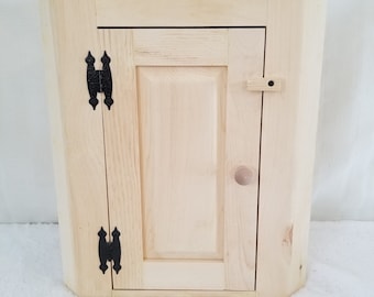 Unfinished Small Wall Corner Cabinet. Measures: 18 3/4" x 11 1/4" x 22" Tall.