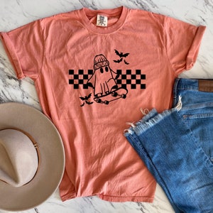 Ghost Riding Skateboard T-Shirt Comfort Colors, Halloween Ghost Checkered Background Shirt