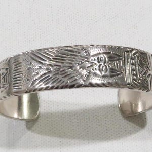 Sterling Unique vintage Alaskan Native Canadian made Native motif cuff etched