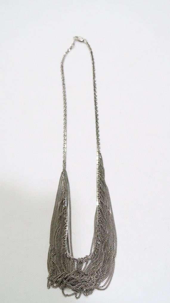 Chainmail fringe necklace with cascading chain lay