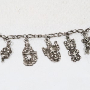 Vintage Mayan Aztec or Peruvian tribal figure sterling charm bracelet
