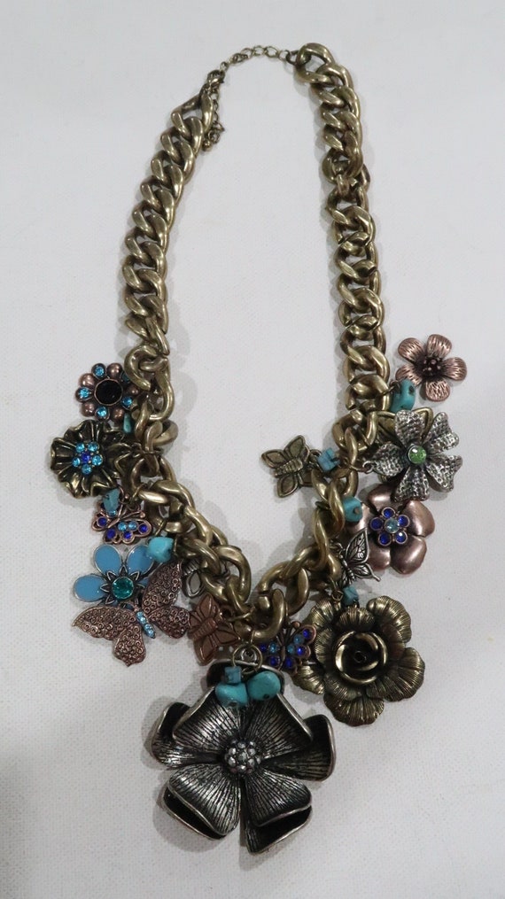 Vintage chunky necklace with flowers and butterfli