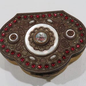 Old French ornate repousse painted French couple w red rhinestones and mother of pearl brass trinket box