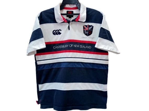 Vintage 90 s Canterbury Nueva Zelanda Rugby Polo Camisa Grande Mangas Cortas Canterbury White Stripe Rugby Polo Tamano L