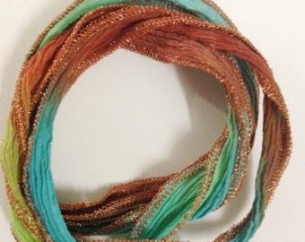 Silk ribbon turquoise-green-copper & bronze-lurex hem