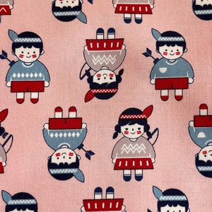 May include: Pink fabric with a repeating pattern of cartoon Native American children wearing traditional clothing. The children are depicted in various poses, some holding bows and arrows, others with their hands on their hips. The fabric is ideal for crafting projects, quilting, and other sewing applications.
