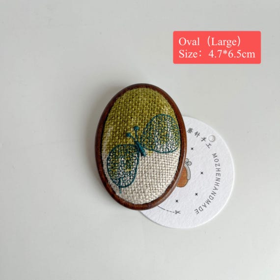 609# ミナ ペルホネン生地を使用したハンドメイドブローチ、蝶の