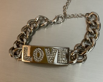 Funky silver-toned ID bracelet with "LOVE" in rhinestones