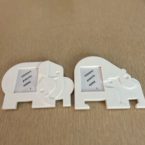 2 cute Tupperware plastic picture frames elephants and polar bears magnetic 1990s