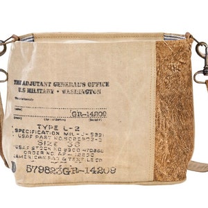 Stamped crossbody shoulder bag made from recycled military tent and truck canvases