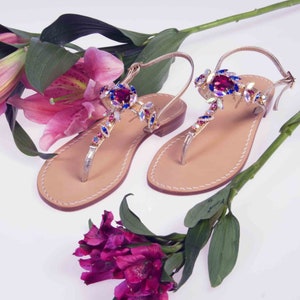 MADE IN ITALY. The Delfina Sandal w Ruby Crystals and Platinum Leather. made by the hands of our Italian Artisans.