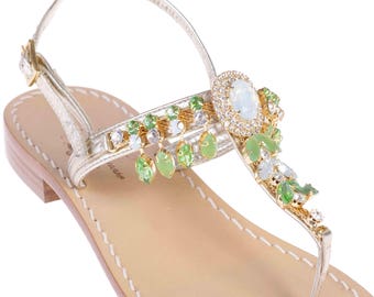 MADE IN ITALY. The Domenica Sandal with Green and Opal Crystals is made with Platinum Leather in Italy!