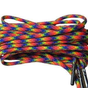 May include: Rainbow shoelaces with a black and blue pattern. The shoelaces are made of a durable, braided material and are perfect for adding a pop of color to any outfit.