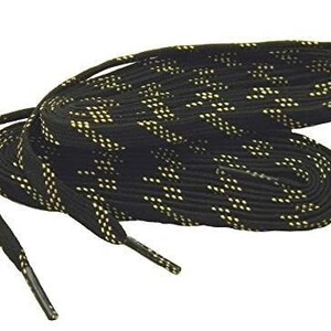 May include: Black and gold shoelaces with a woven pattern. The laces are coiled and ready to be used.