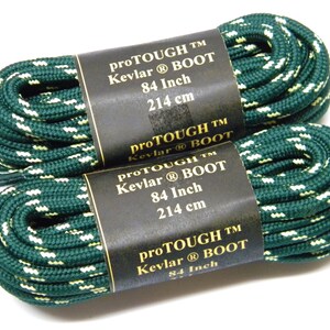 May include: Two pairs of green and white shoelaces with black labels that read "pro TOUGH TM Kevlar&reg; BOOT 84 Inch 214 cm".