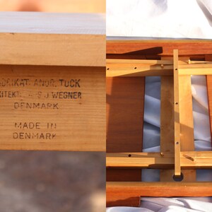 Puede incluir: Primer plano de una mesa de madera con una etiqueta que dice "Fabrikant.  Anker.  Tuck.  Arkitekt.  ...S.J.  Wegner.  Denmark.  Made in Denmark."
