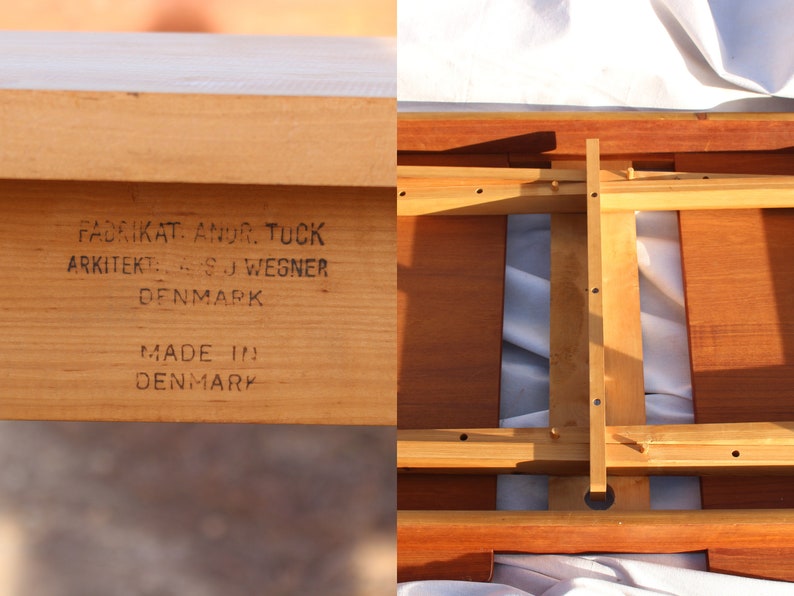 Puede incluir: Primer plano de una mesa de madera con una etiqueta que dice "Fabrikant.  Anker.  Tuck.  Arkitekt.  ...S.J.  Wegner.  Denmark.  Made in Denmark."