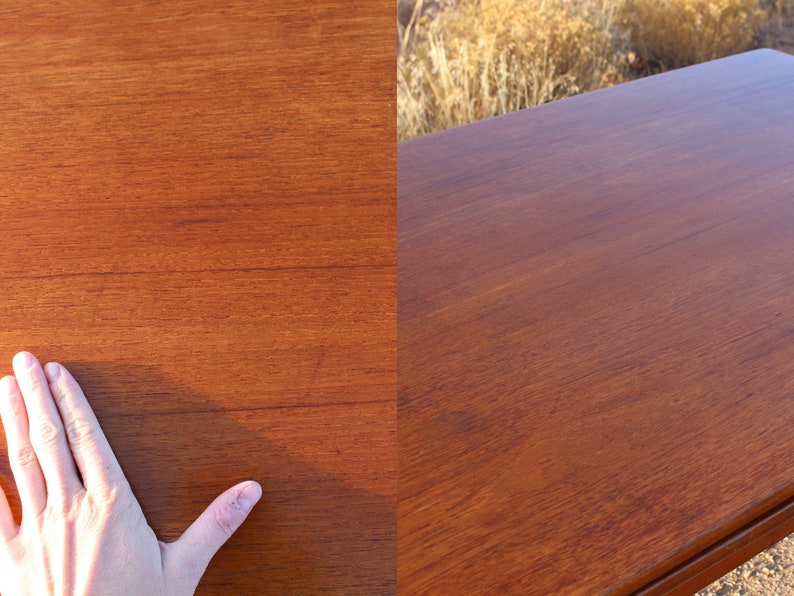 Puede incluir: Primer plano de una superficie de madera lisa de color marr&oacute;n oscuro. La veta de la madera es visible y la superficie parece pulida.