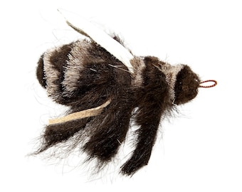 May include: A brown and white fuzzy bee toy with a white wing and a brown wire loop.