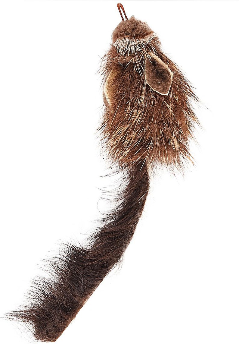 May include: A brown and black plush cat toy shaped like a mouse with a long tail. The toy is designed to be a catnip toy.